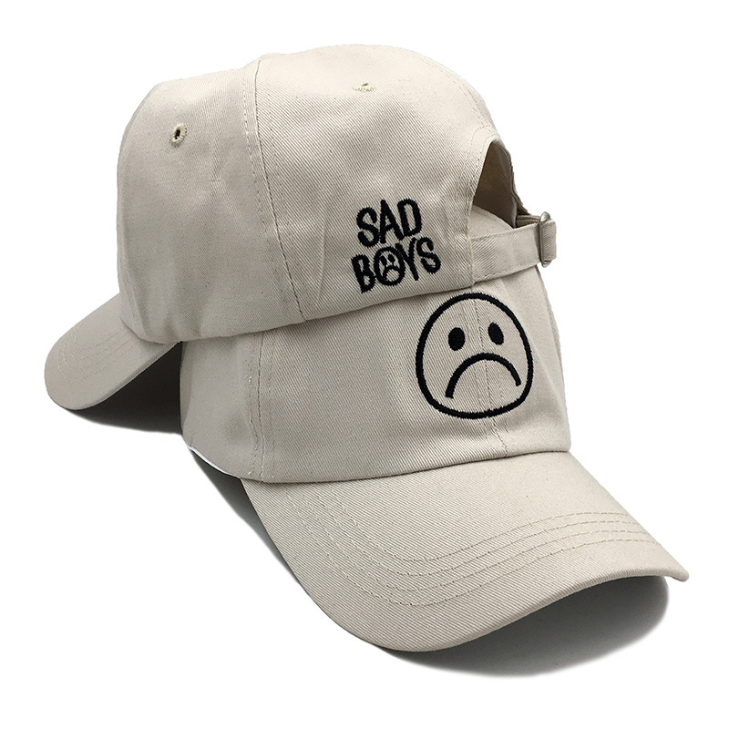 Foreign trade hot style crying face sad boys embroidery soft top baseball cap men and women sun visor men and women outdoor sunshade