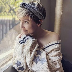 Autumn and winter solid color long-sleeved cardigan femininity commuting European and American bat wing knitted beige single-breasted sweater jacket