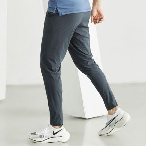 Men's athletic pants, slim-fit running and fitness pants, summer thin ice silk tapered leg long pants, training pants with tapered legs.