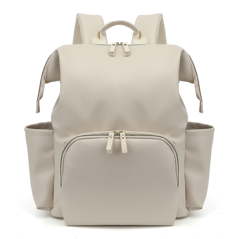 Large capacity PU leather backpack, diaper bag, maternity and baby handbag, portable and lightweight. - Image 5