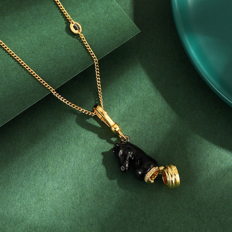 Wholesale enamel-glazed black horse head chess pendant, niche fashion, openable bag charm for men and women. - Image 2