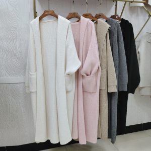 High-end mid-length hooded knitted cardigan for women, thickened for autumn and winter, soft and cozy style, perfect for layering under a coat.