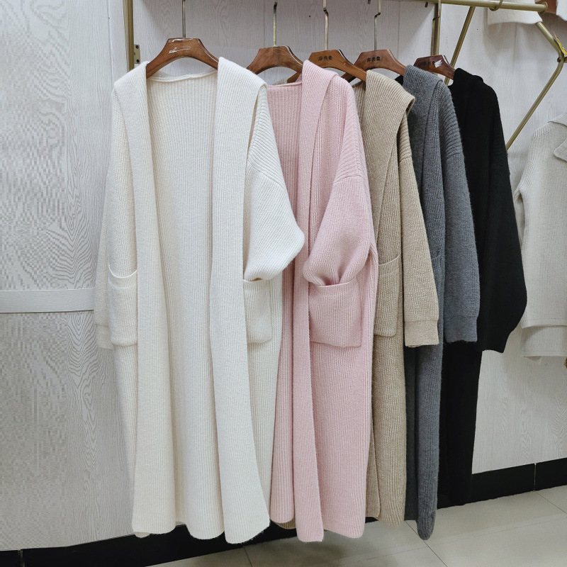 High-end mid-length hooded knitted cardigan for women, thickened for autumn and winter, soft and cozy style, perfect for layering under a coat.