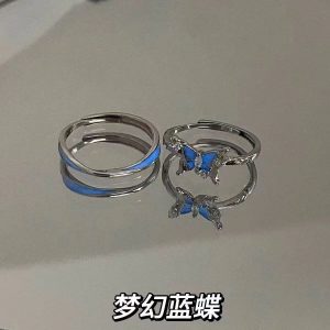 Niche high-end dreamy blue butterfly glow-in-the-dark butterfly couple rings, understated luxury, versatile, luminous, atmospheric rings for men and women.