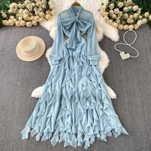 V-Neck Dress with Tie Detail and Layered Ruffles