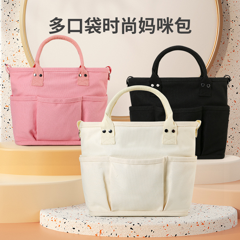 Mommy bag wholesale multi-pocket hand-held crossbody mother and baby bag super large capacity lightweight splash-proof mommy bag tote bag - Image 2