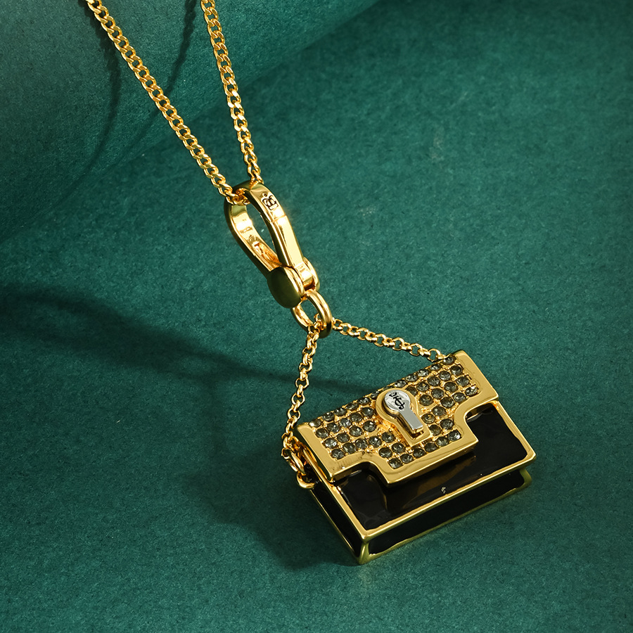 High-end enamel-glazed cross-border, diamond-encrusted black handbag with lipstick pendant necklace, exquisite charm.