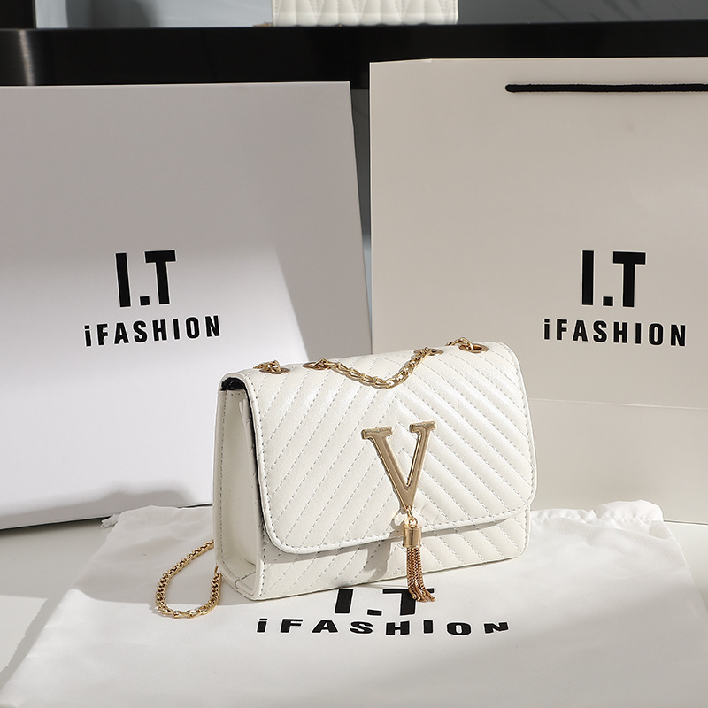 Trendy women's bag 2021 new fashion striped embroidered shoulder bag V-shaped tassel decoration messenger bag - Image 2