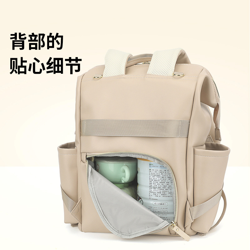 Large capacity PU leather backpack, diaper bag, maternity and baby handbag, portable and lightweight. - Image 2