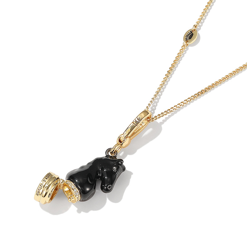 Wholesale enamel-glazed black horse head chess pendant, niche fashion, openable bag charm for men and women.