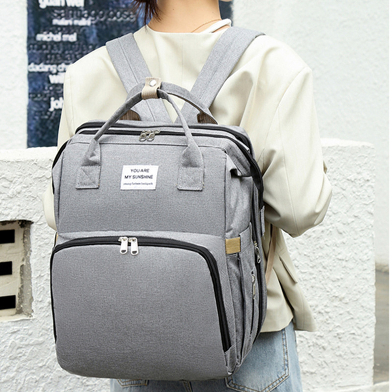 Factory wholesale mommy bag portable folding backpack mommy bag multifunctional can hang baby stroller crib mother and baby bag - Image 2