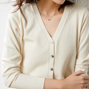 Autumn and winter 2021 new knitted sweater women's cardigan jacket solid color V-neck slim wool knitted outer sweater wholesale