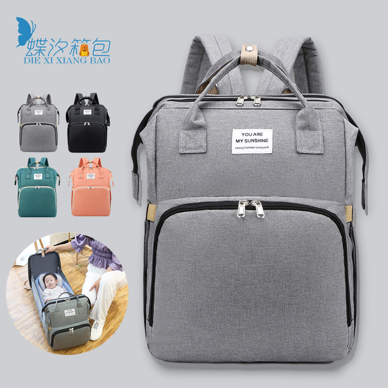 Factory wholesale mommy bag portable folding backpack mommy bag multifunctional can hang baby stroller crib mother and baby bag