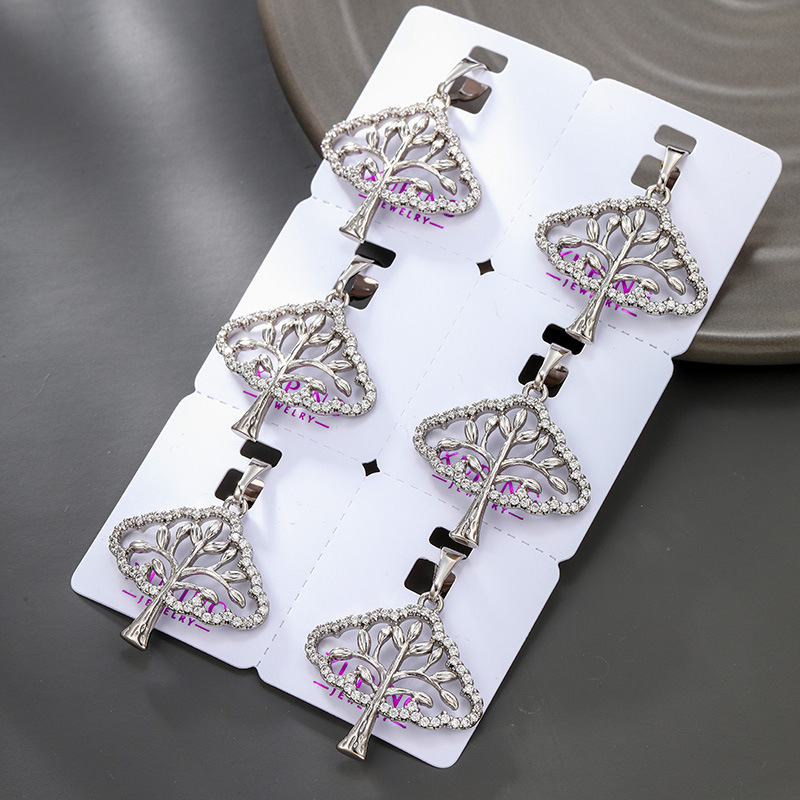 Xuping's new European and American cross-border artificial gemstone hollow tree necklace pendant, a casual and unique design. - Image 3