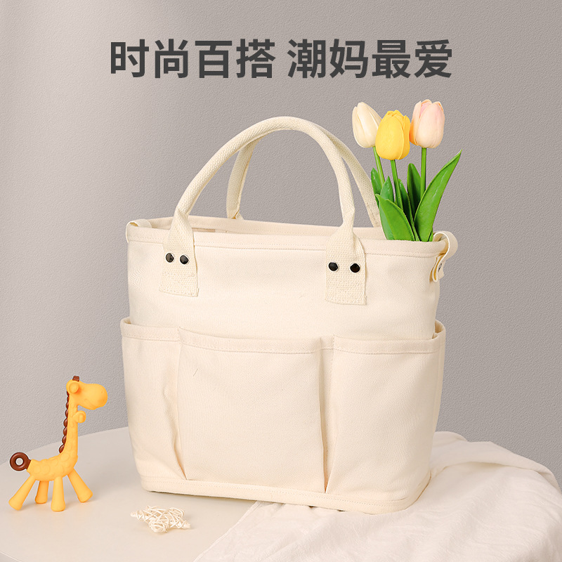 Mommy bag wholesale multi-pocket hand-held crossbody mother and baby bag super large capacity lightweight splash-proof mommy bag tote bag