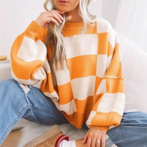 Amazon cross-border e-commerce for women's plus-size loose-fitting color-blocked autumn and winter long-sleeved round neck knitwear for export.